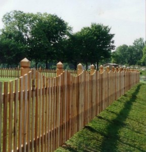 White Cedar custom scalloped spaced picket fence with hunterton style posts