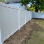 white vinyl fence