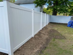 white vinyl fence